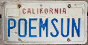 Photo of California license plate that reads POEMSUN. 