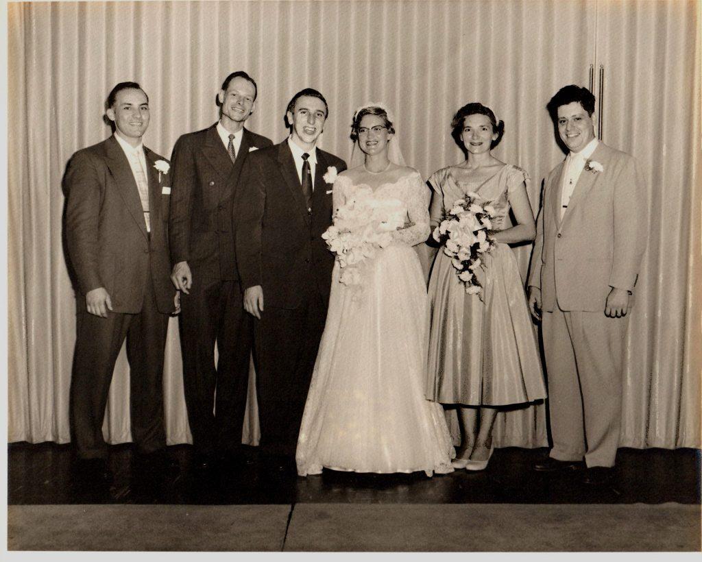 Photo of Bill and Mary Lee with wedding party.