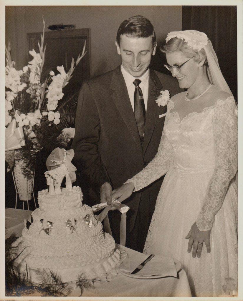 Bill and Mary Lee cutting their wedding cake