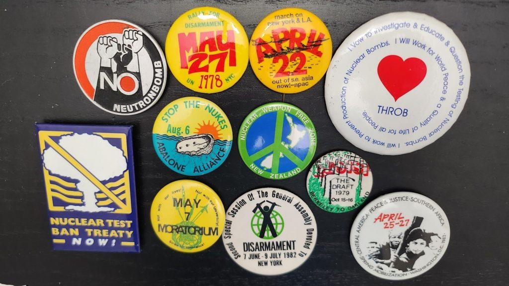 photo showing buttons from peace and anti nuclear movements